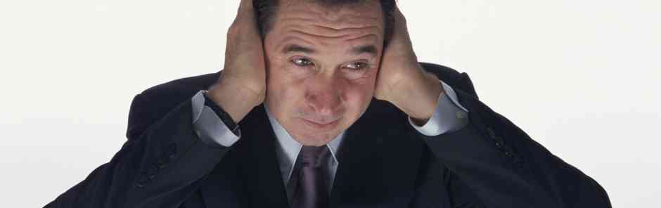 Aberdeen Advisors M&A: Businessman covering his ears with his hands