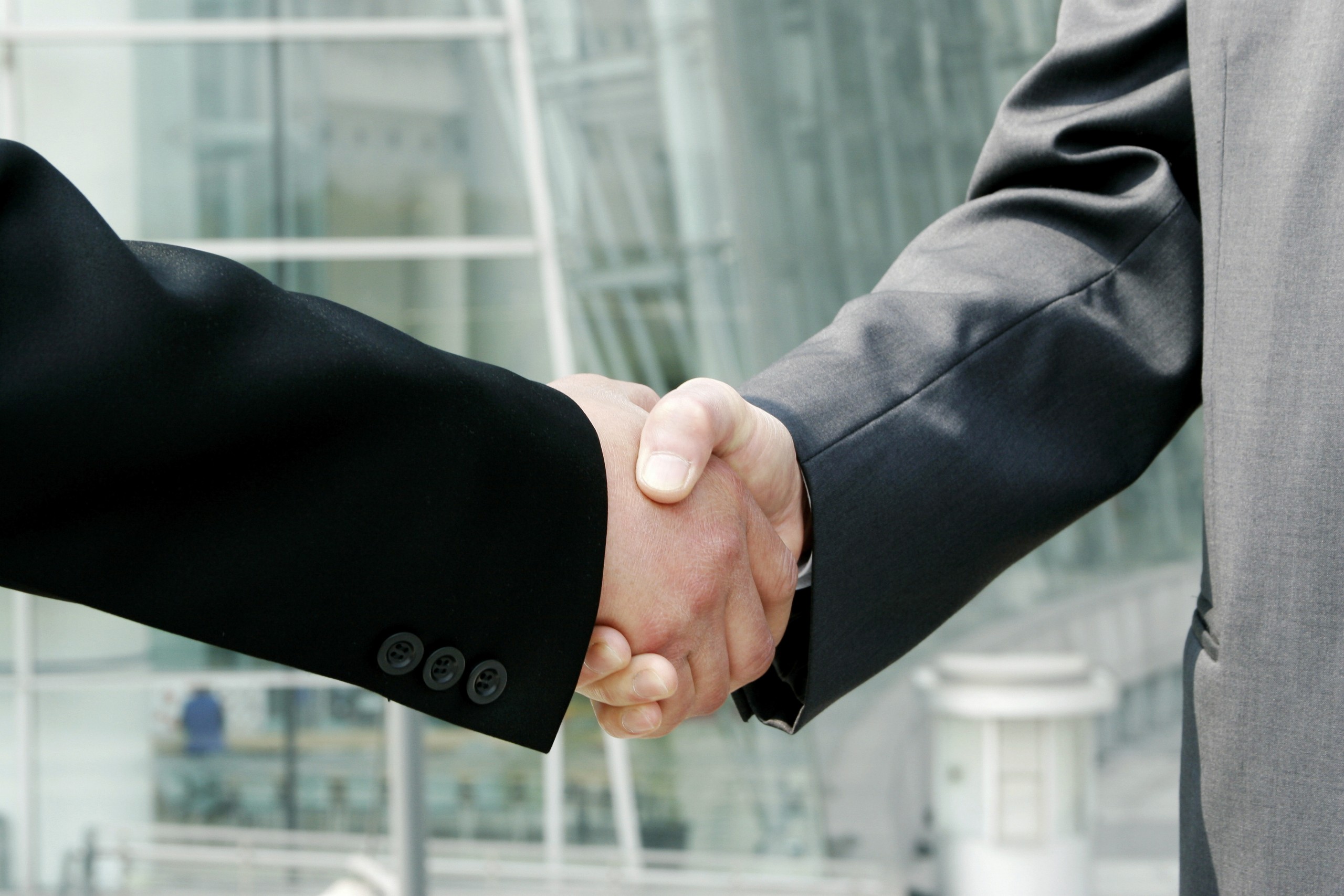 Aberdeen Advisors M&A: business men shaking hands
